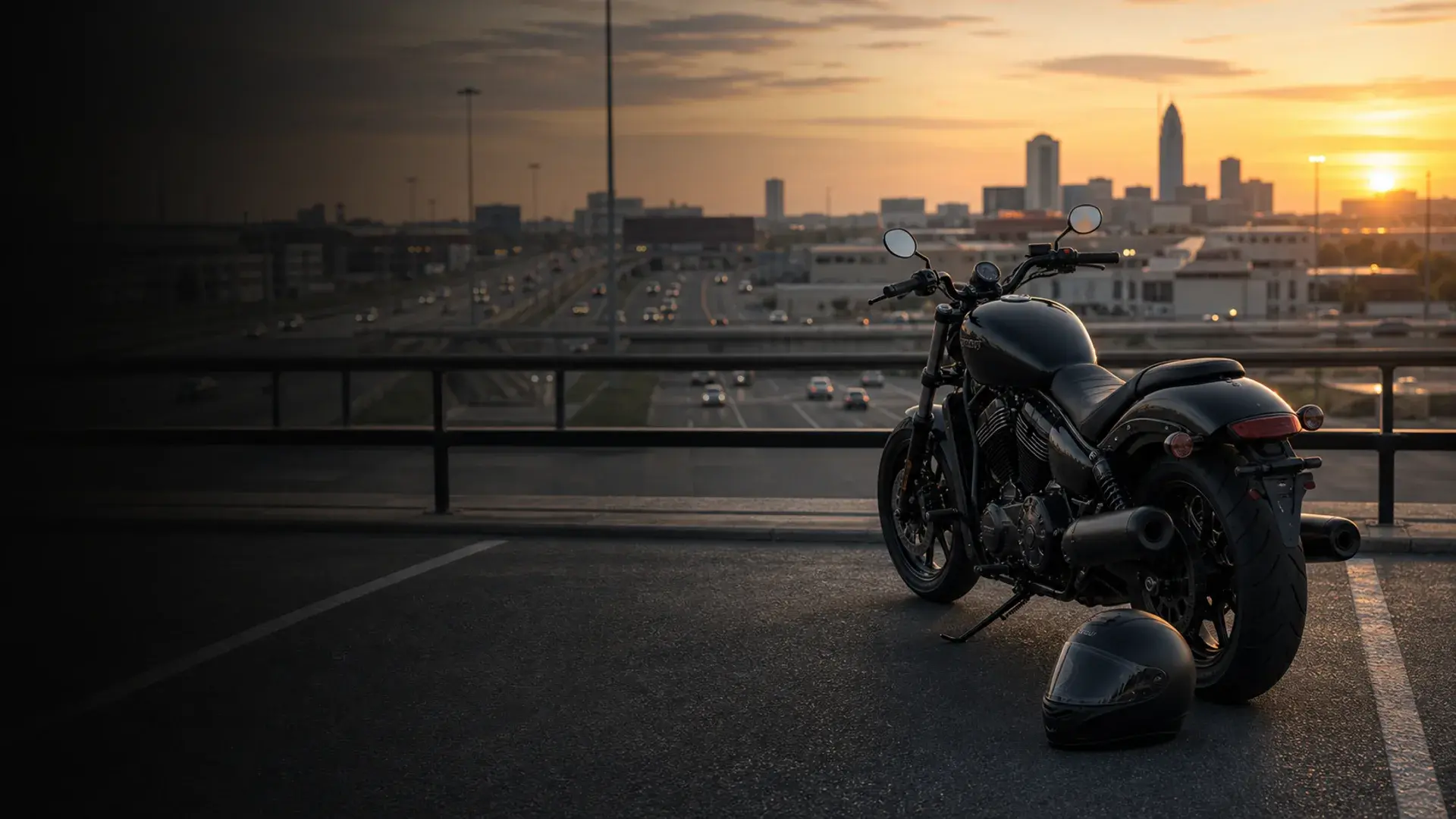 Motorcycle parked safely near a Midwest City commuter overlook with I-40 and morning traffic beyond