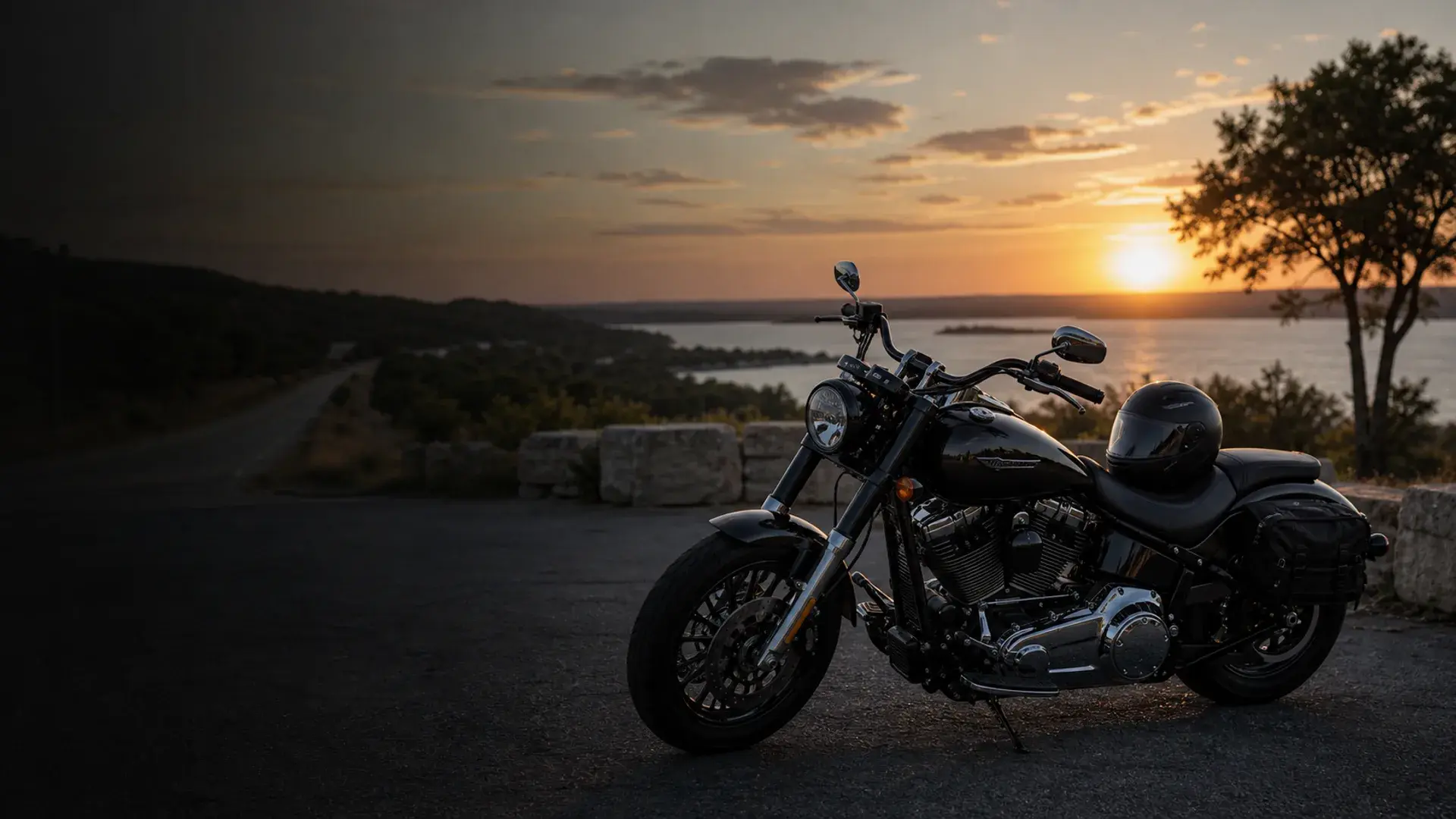 Motorcycle parked safely near an Ardmore scenic road with southern Oklahoma lake-route context at sunset